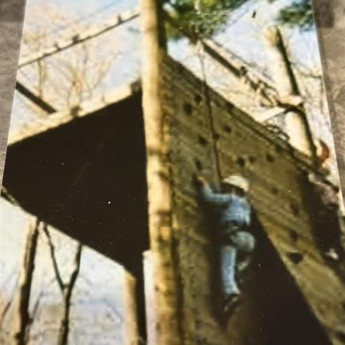 Christine scaling a wall in the princess weekend trip