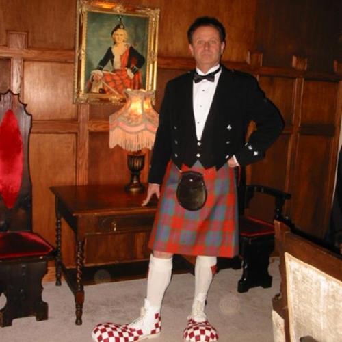 Douglas  at a Robert Burns Supper at Jennifer Nelson's home - he changed shoes when more guests arrived circa 2004.