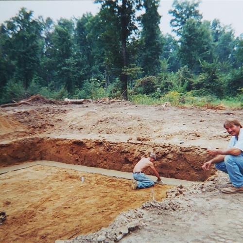 Rick by the shower house foundation