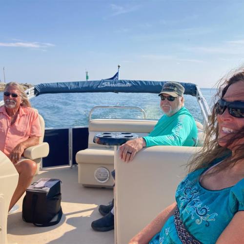 Rick with wife Lori and friend Dan Wilcoxson ( Fire)