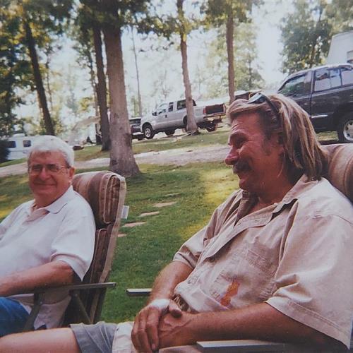 Rick with his father Charlie visiting with campers