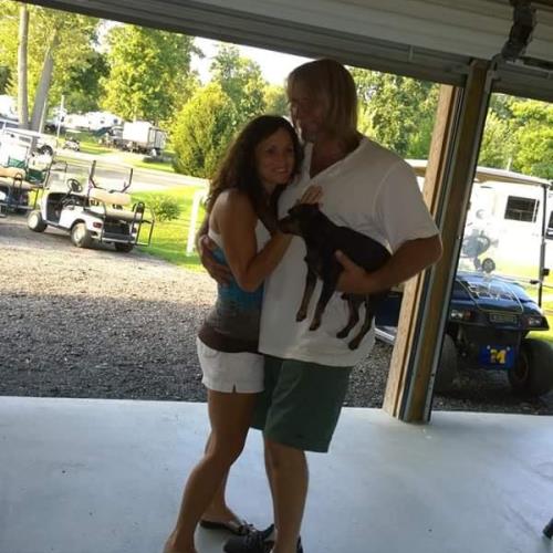 Rick and his wife Lori dancing with his jealous  dog Ranger