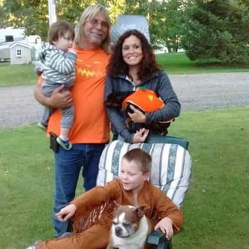 Rick with wife Lori and step grandsons  at GLC Halloween party
