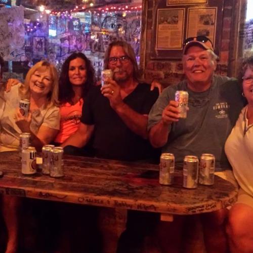 Rick with wife Lori and friends Steve and Dnece coleman  alo g with Paul and Jan Osborn at Florabama