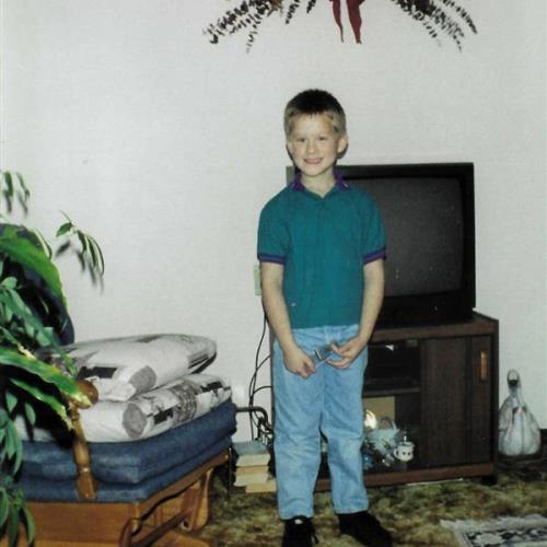 Tyler (6 years old) at Great Mammaw Burns' House in Milton, WV, 1995