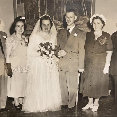 Wedding day.  Aug 5, 1950. With their parents