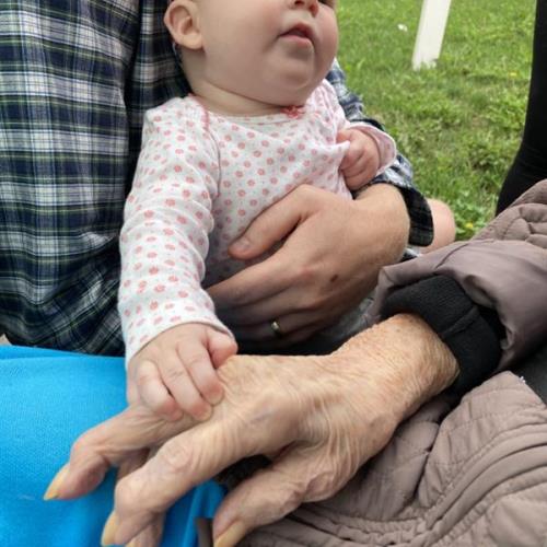 Mom meeting Eden for the first time.