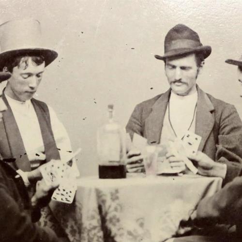 The photograph of Billy the Kid (second from left).