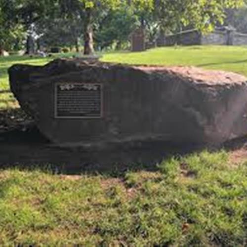 Boulder that was in Arizona. Erma sat on it while writing, upon her passing, the boulder was moved to Woodland.