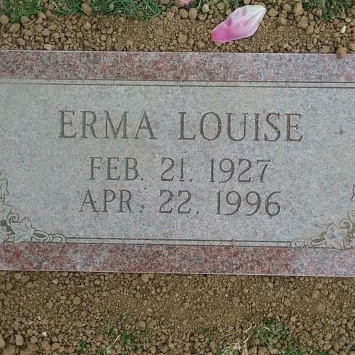 Gravestone of Erma. It is behind the boulder.