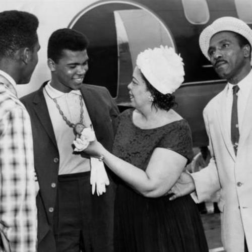 At age 18, Ali competes at the 1960 Summer Olympics in Rome and wins the light-heavyweight gold medal, defeating Zbigniew Pietrzykowski of Poland.