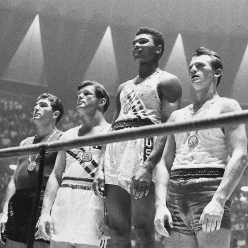 Gold medalist Muhammad Ali on the podium after his win at the 1960 Rome Olympics.