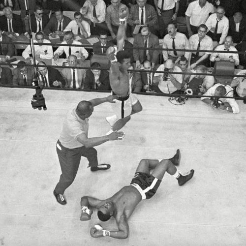 Sonny Liston and Cassius Clay (Muhammad Ali) Sonny Liston on the canvas while Cassius Clay (later Muhammad Ali) raises his arms in triumph after his first-round defeat of Liston in 1965.