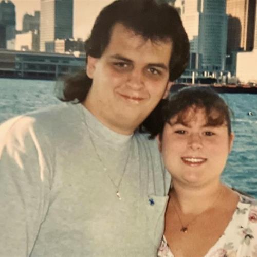 Dave & Bev in Windsor while engaged. Detroit in the background