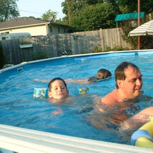 Dave and the Kids enjoying Uncle Eddie & Aunt Stella's pool